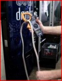 How to determine if a compressor in a a vending machine is defective using a clamp meter
